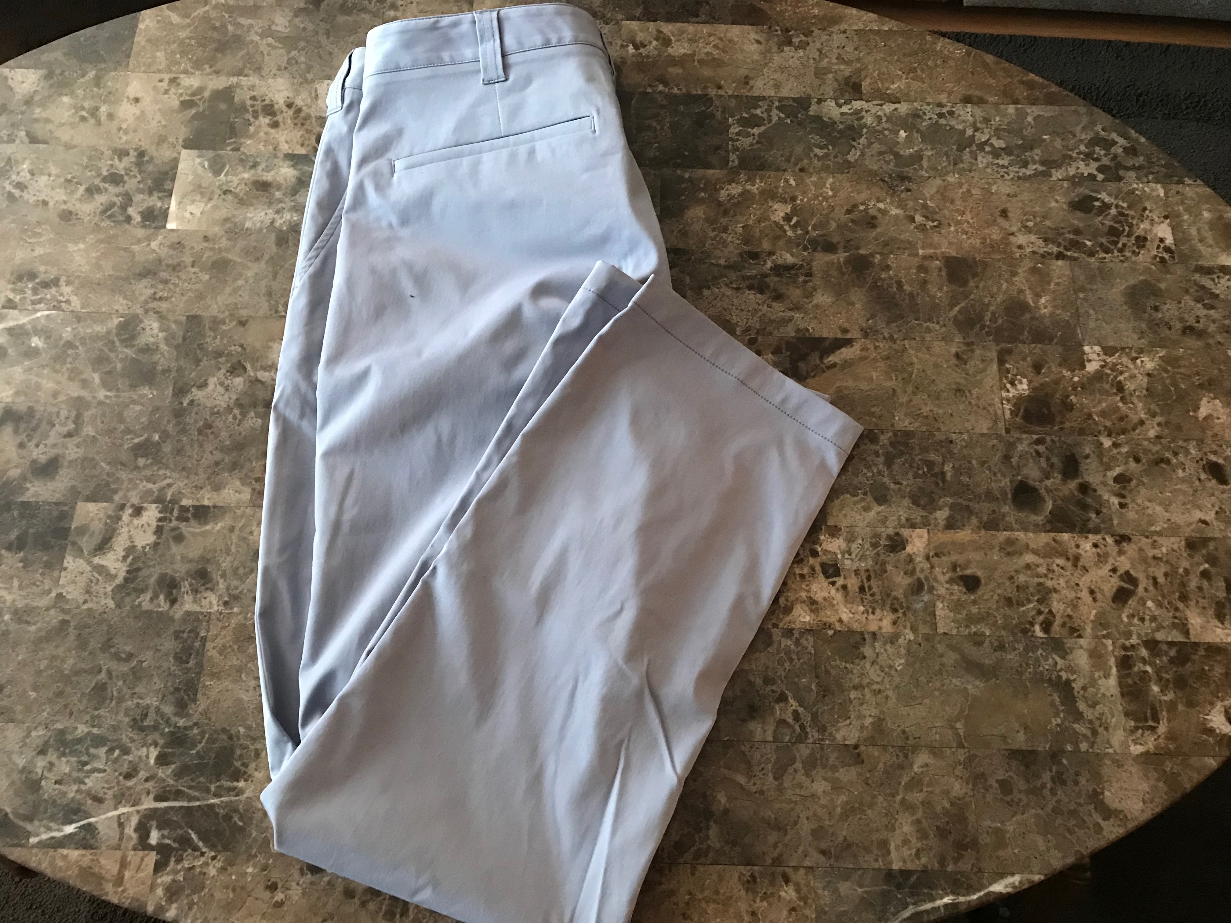 a pair of pants on a marble surface