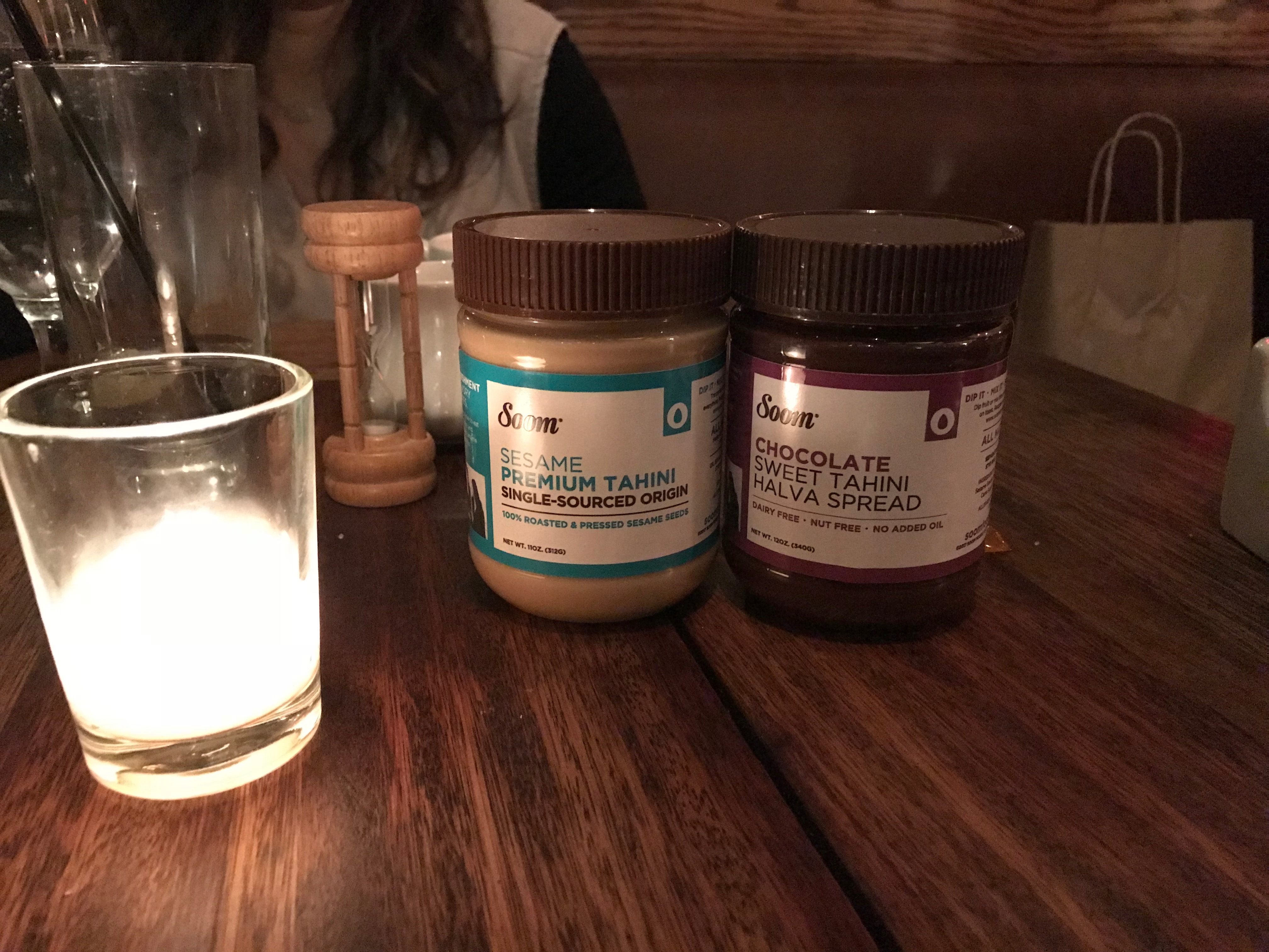 a group of jars of peanut butter on a table