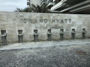 a stone wall with a sign