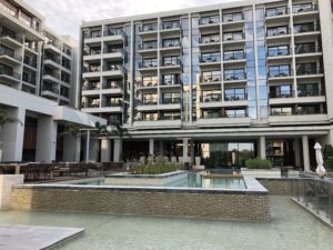 a building with a pool and a pool