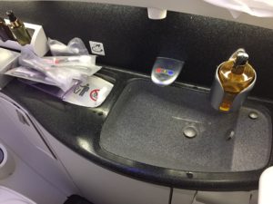 a sink with a bottle in it
