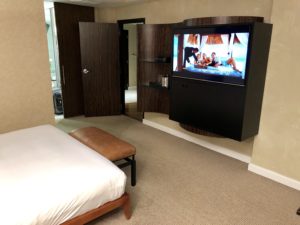 a bedroom with a tv