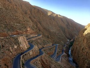 a winding road in a mountain