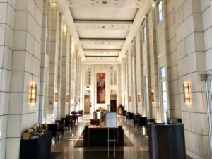 a long hallway with many windows