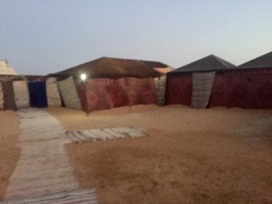 a group of tents in a desert