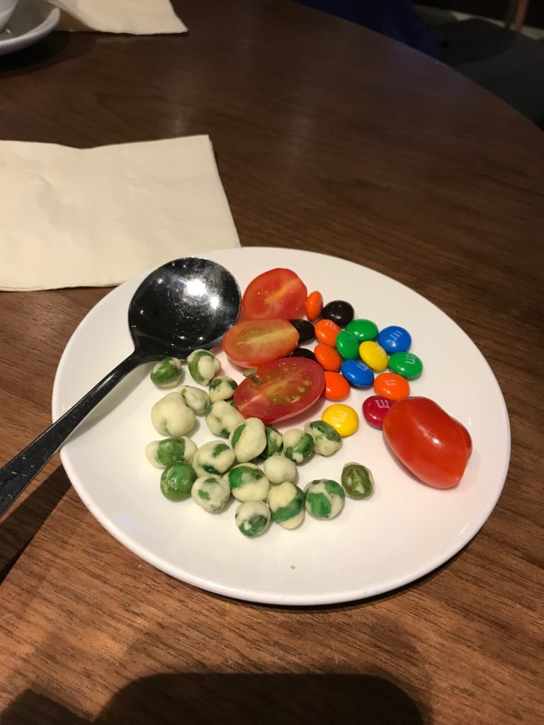 a plate of food with a spoon