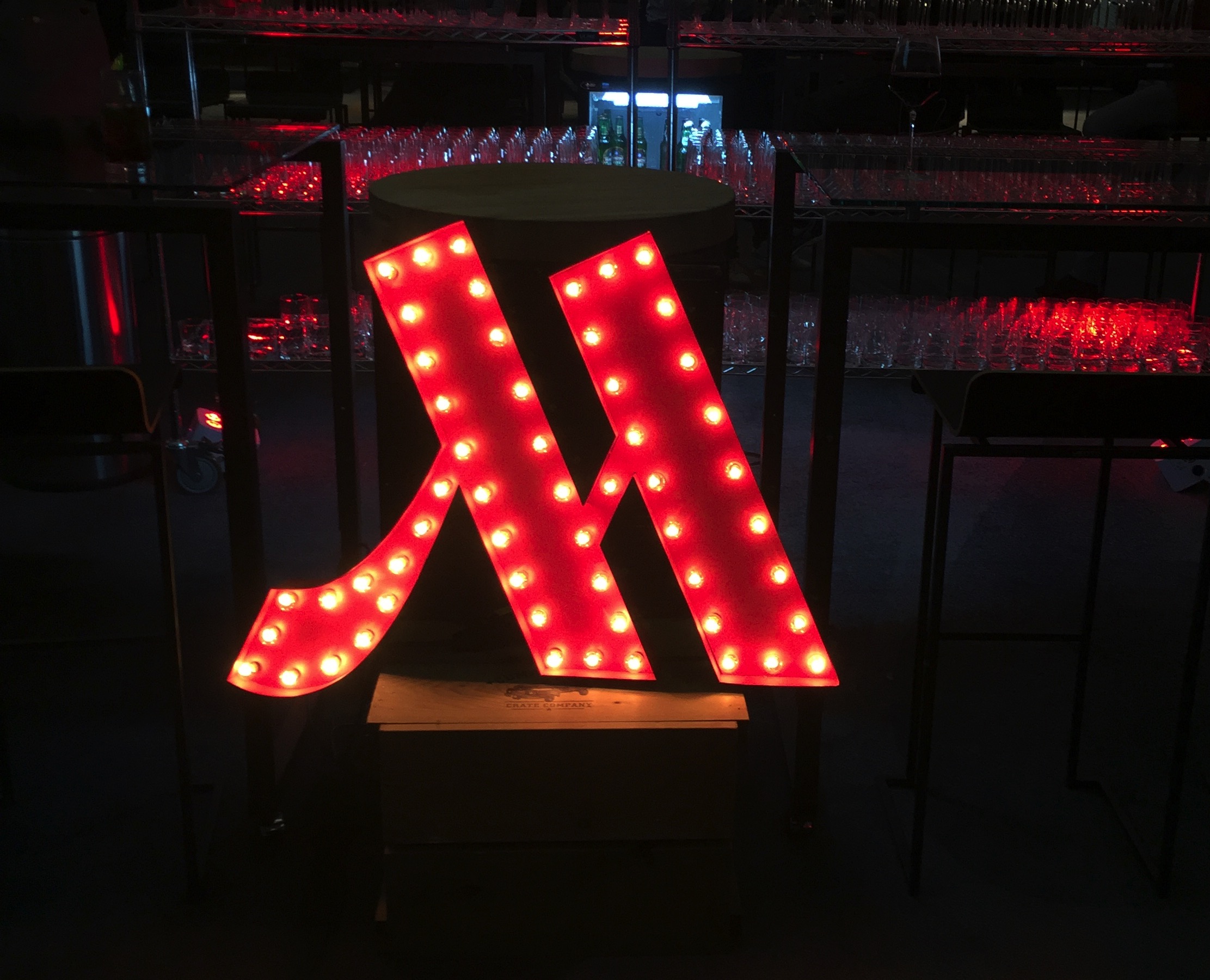 a large red light up sign