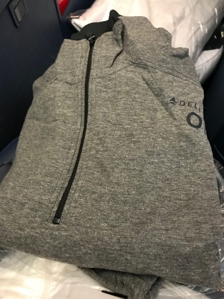 a grey sweatshirt on a plane