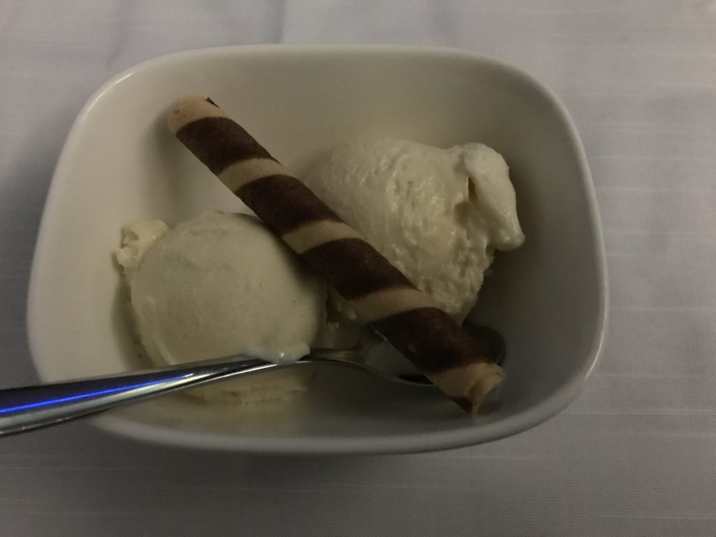 a bowl of ice cream and a spoon