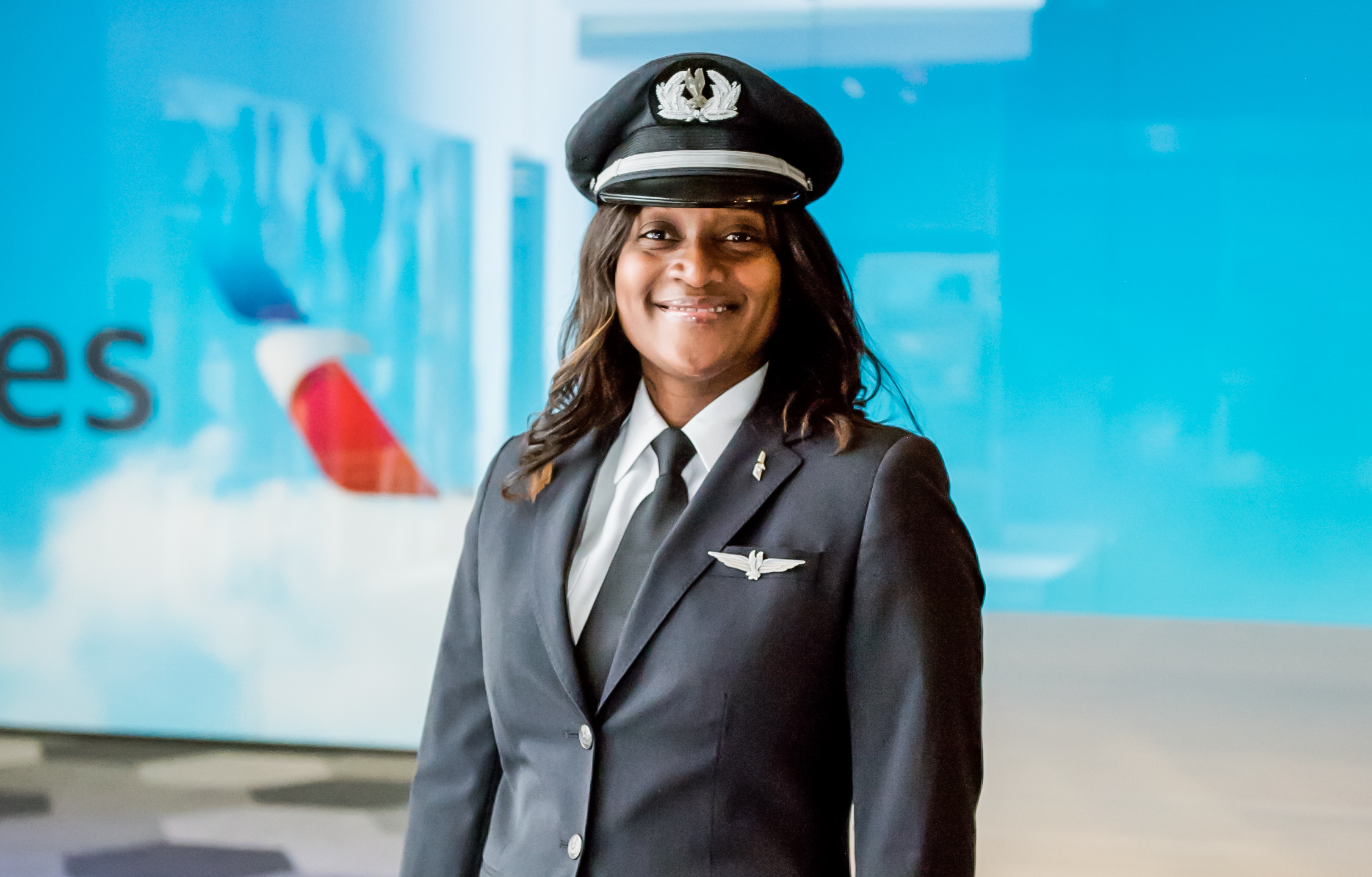 a woman in a uniform and hat