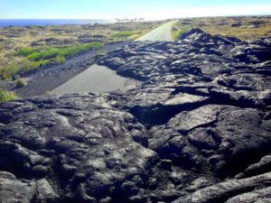 a road leading to a lava field