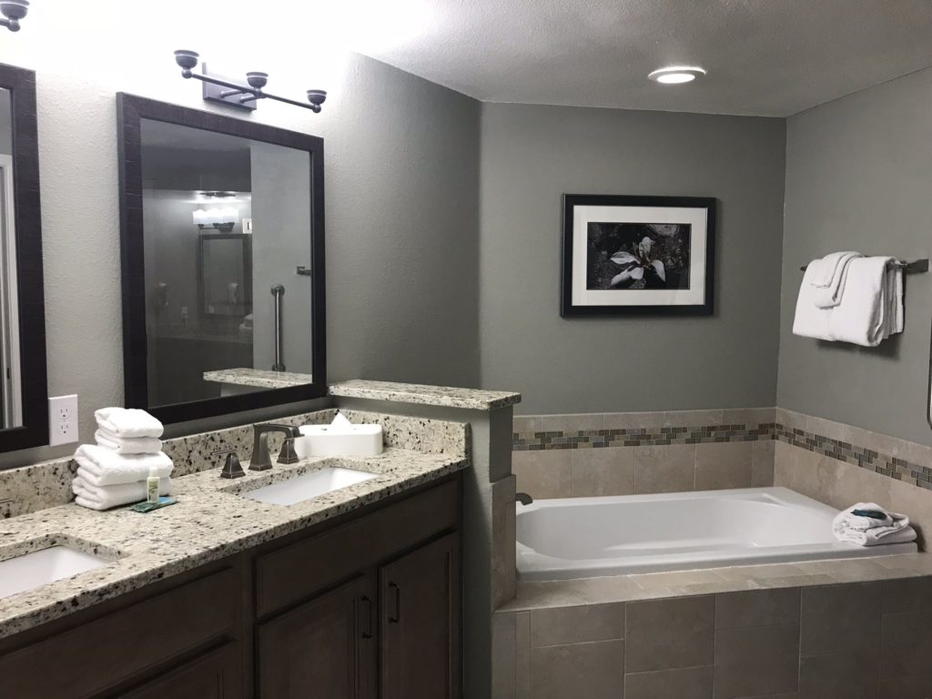 a bathroom with a bathtub and sink
