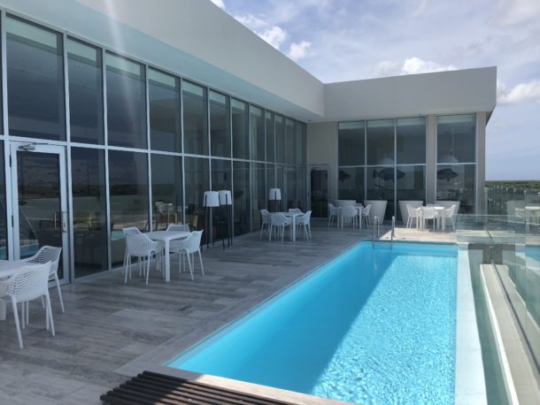 Swimming at The Airport - VIP Lounge Punta Cana Review - TravelUpdate