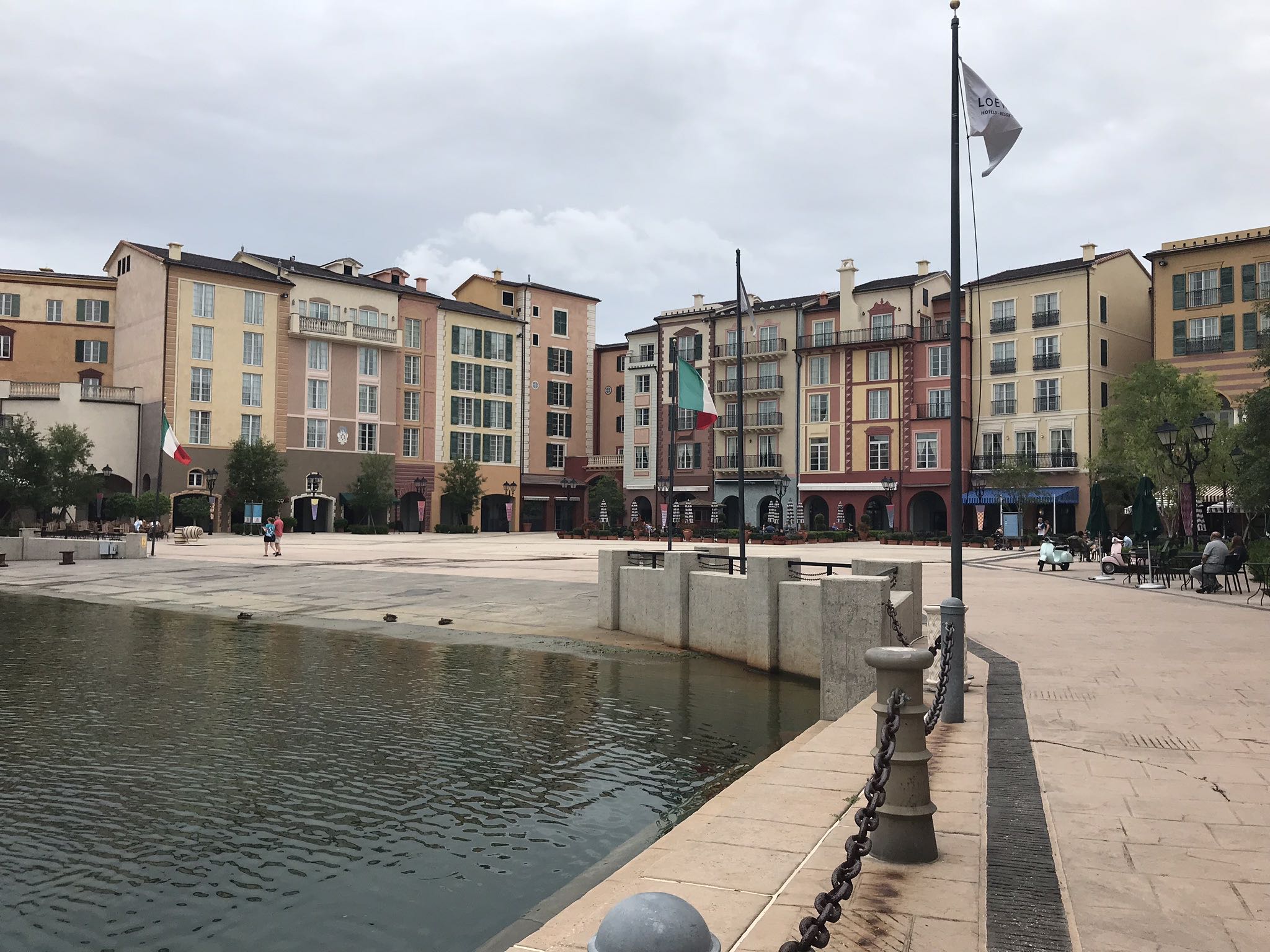 a building next to a body of water