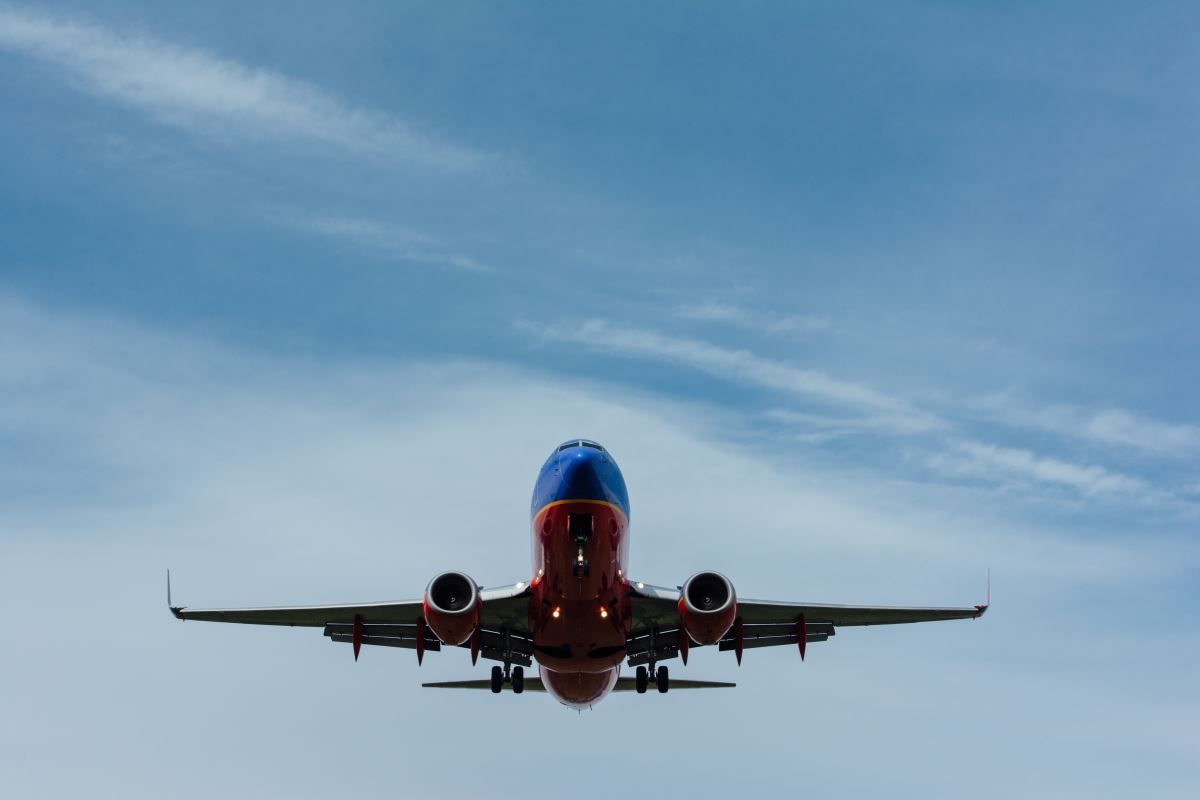 a plane flying in the sky