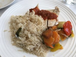 a plate of rice and vegetables