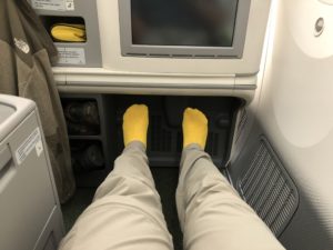 a person's legs in yellow socks