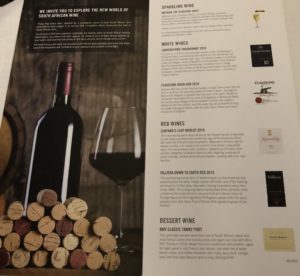 a magazine with wine corks and wine bottles