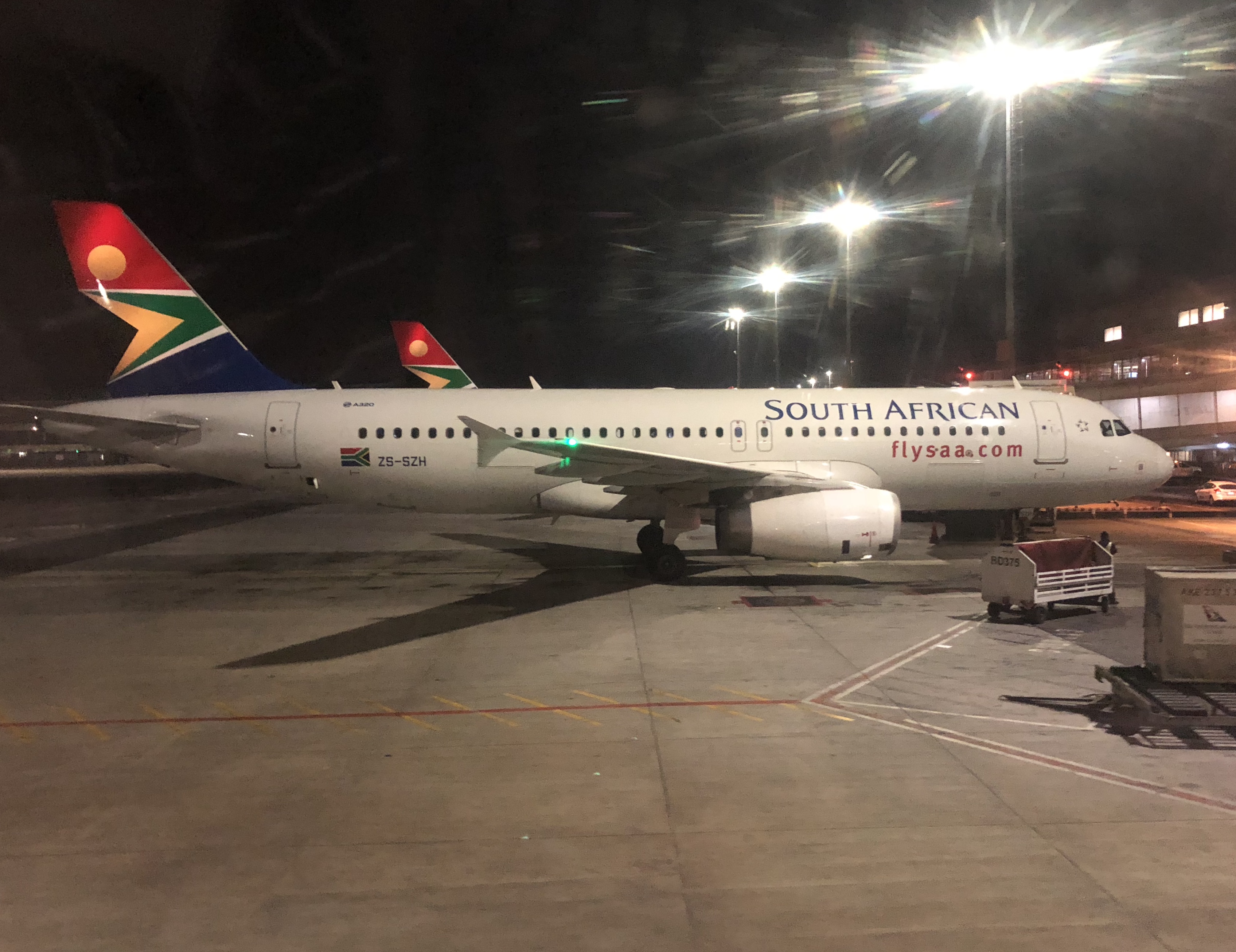 a plane on the tarmac at night