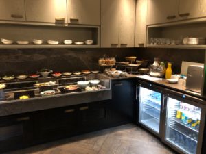 a kitchen with a fridge and food