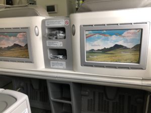 a row of screens on a plane