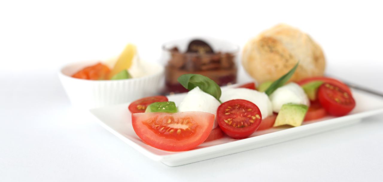 a plate of food on a white surface