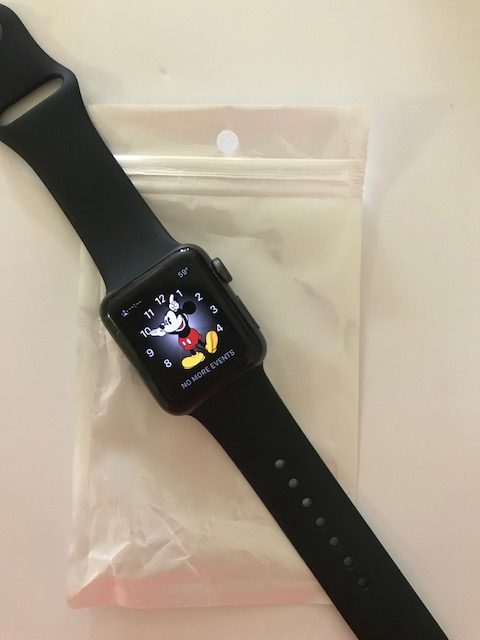 a black watch with a cartoon on it