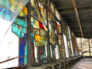 a long shot of a stained glass wall