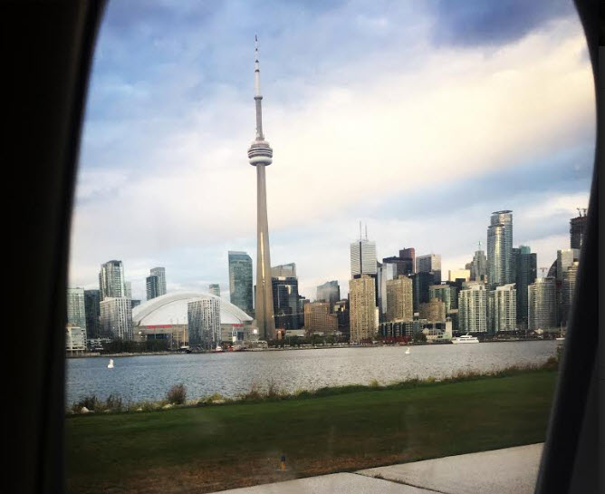 a city skyline seen through a window