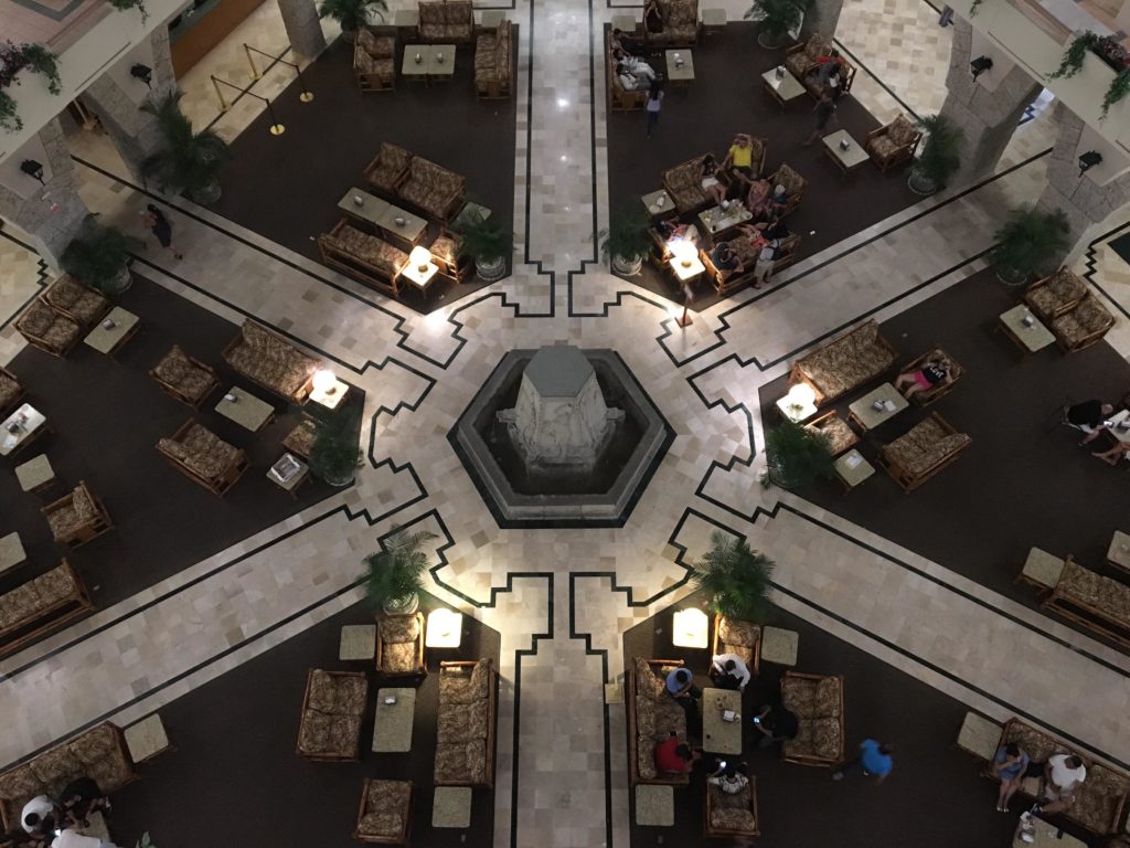 a group of people sitting at tables in a room