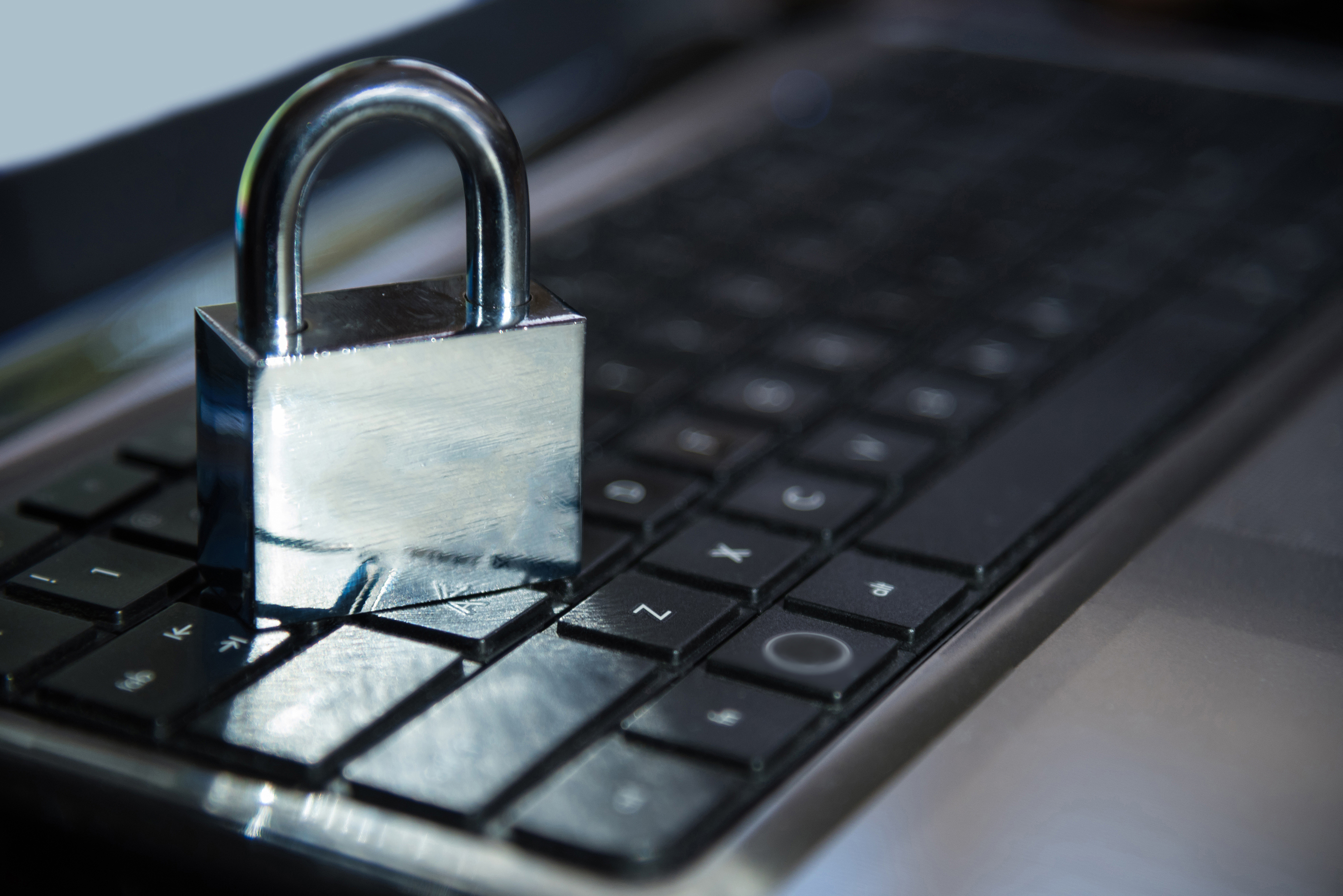 a padlock on a keyboard