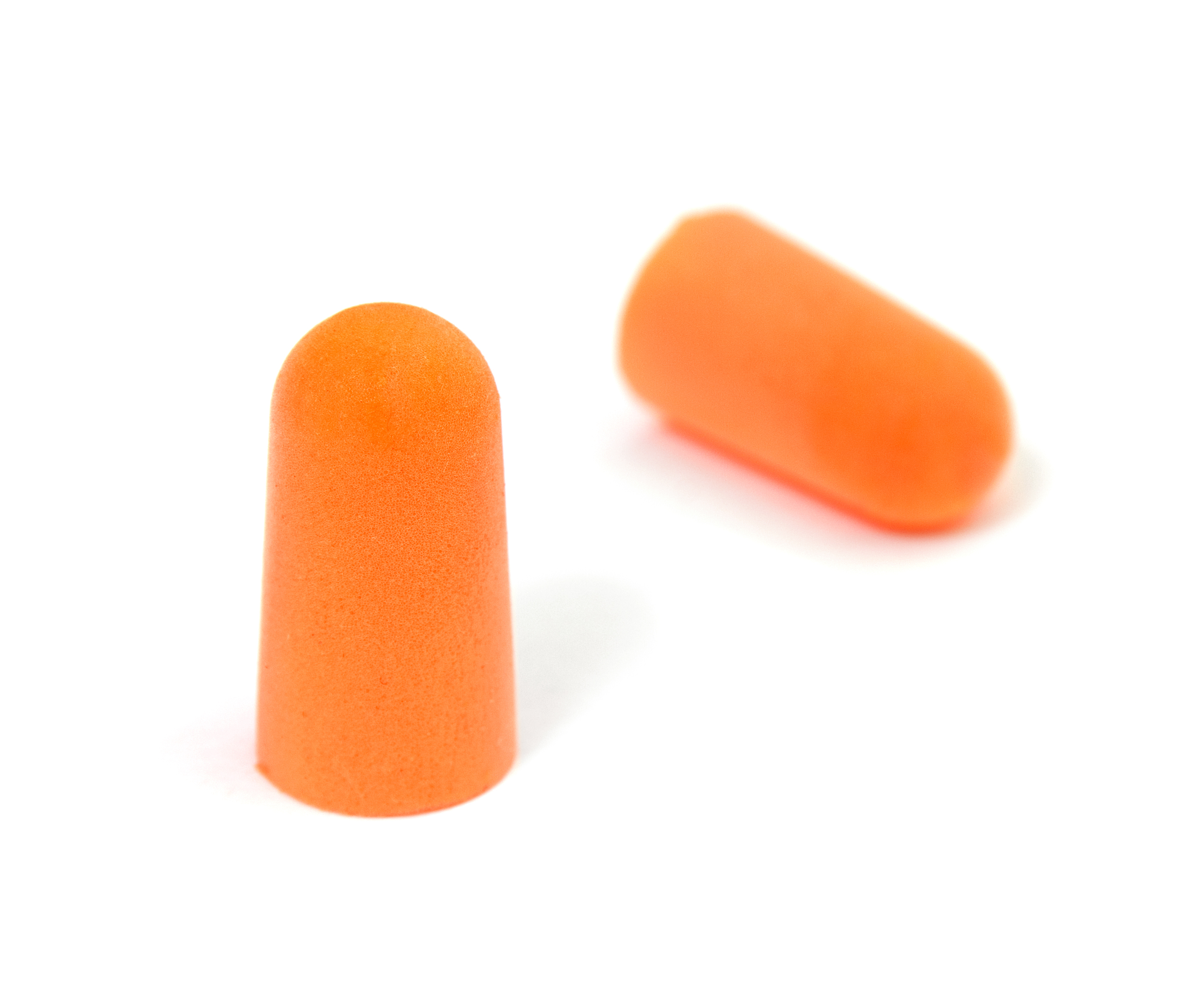 a pair of orange earplugs