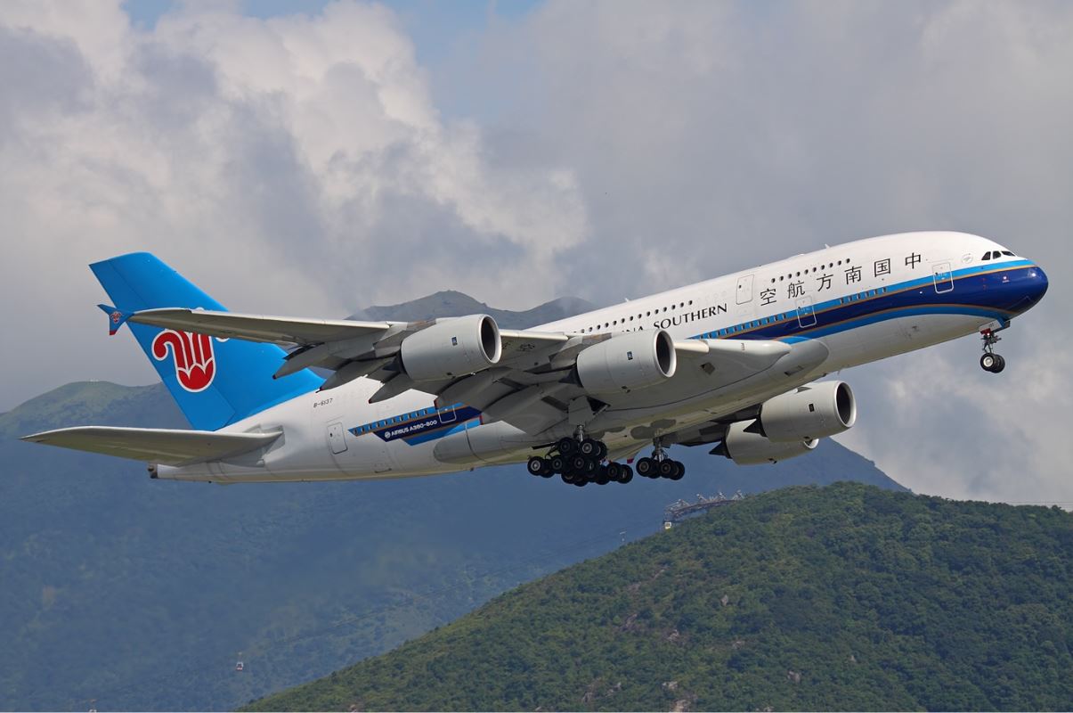 a large airplane flying in the sky