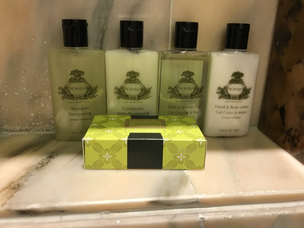 a group of bottles of shampoo and soap