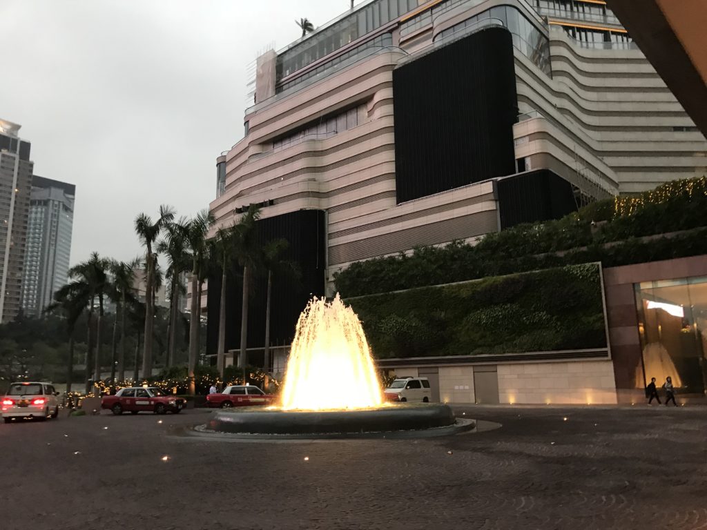 a fountain in front of a building