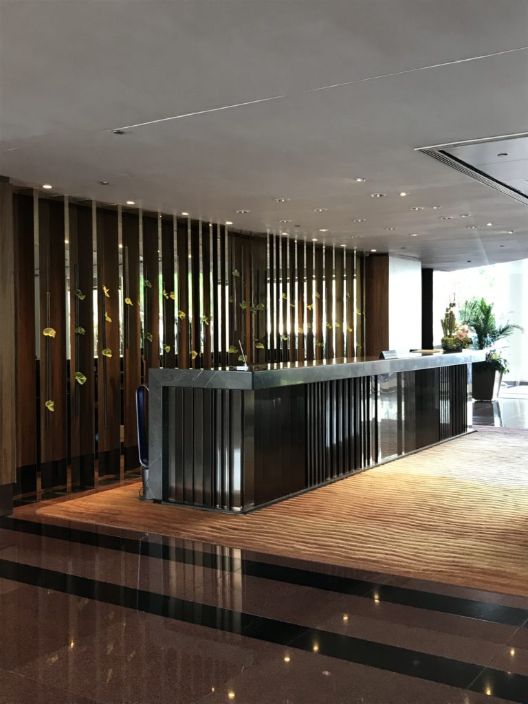 a reception desk in a hotel