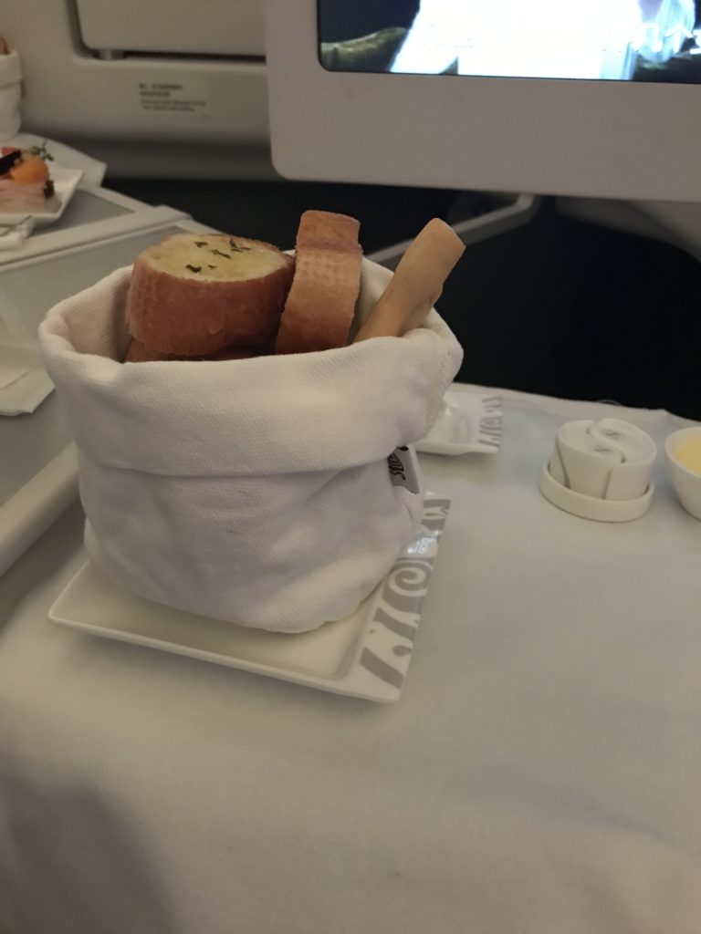 a bag of bread on a plate
