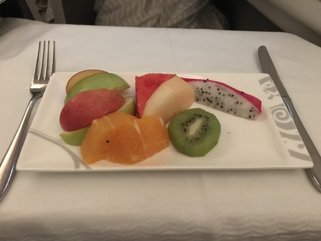 a plate of fruit on a table