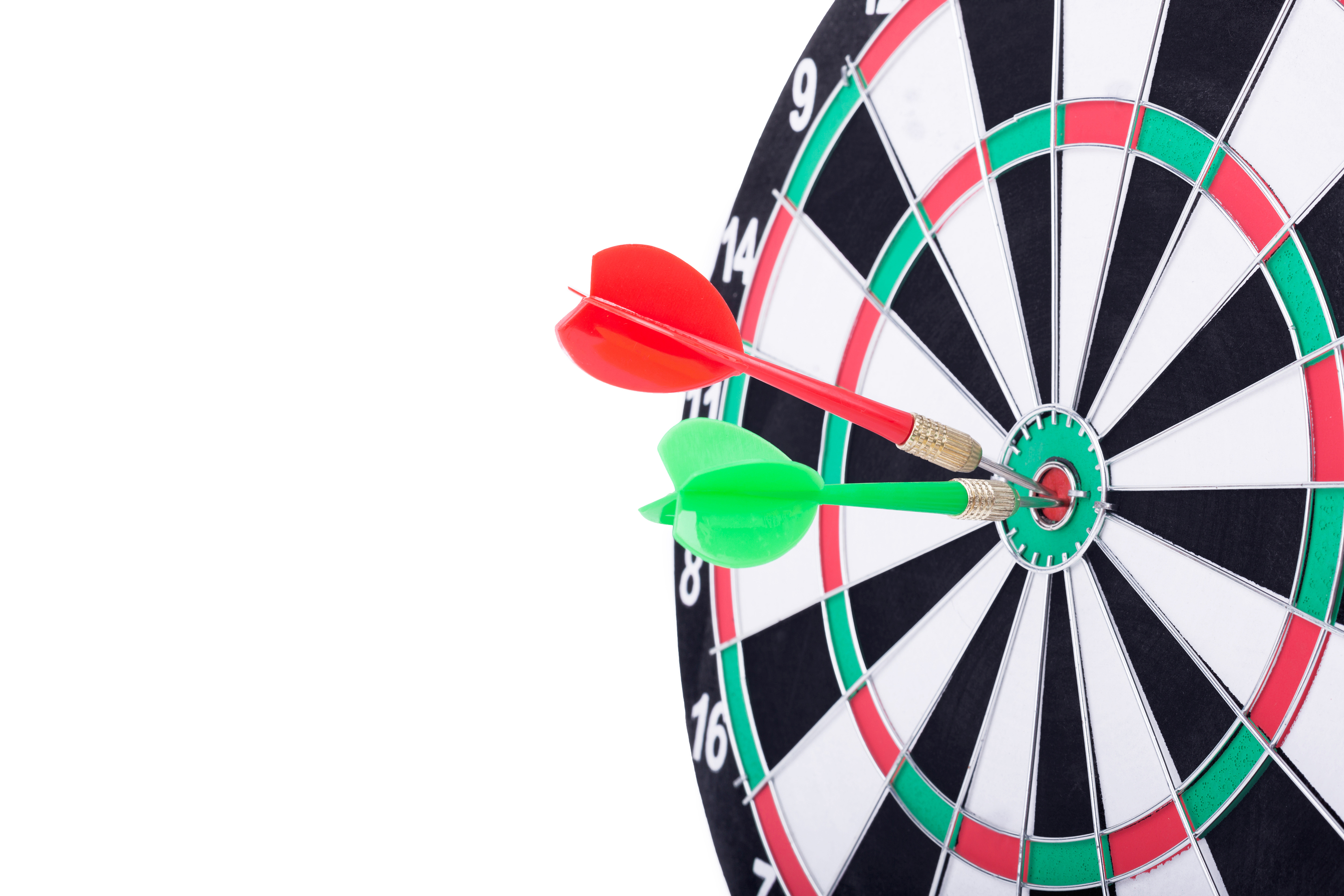 a dart board with darts in the bullseye