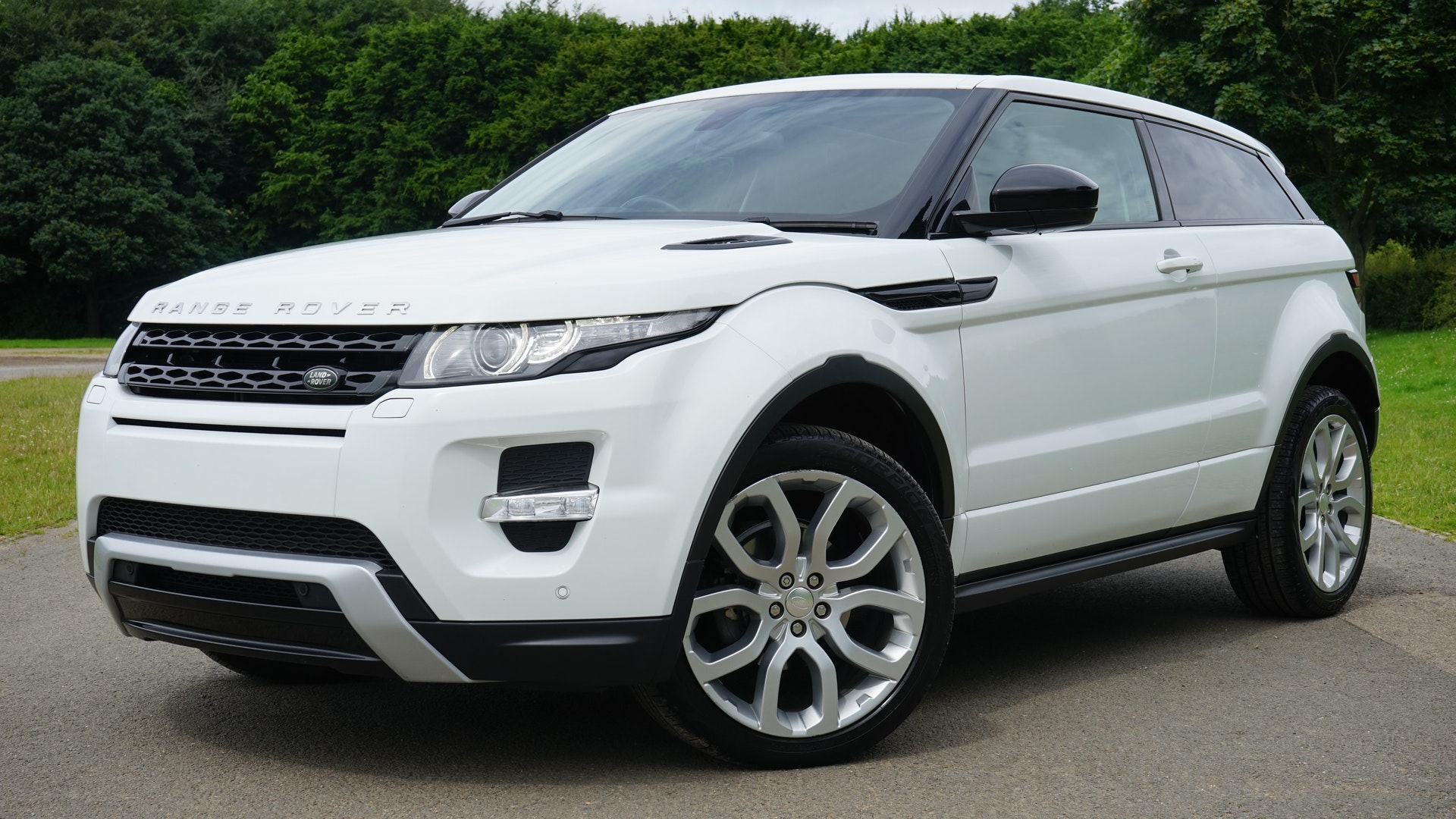 a white car parked on the road