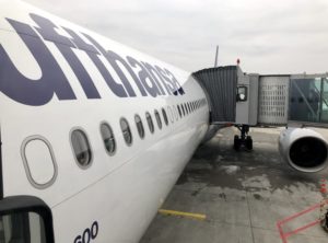 a passenger plane with a door open