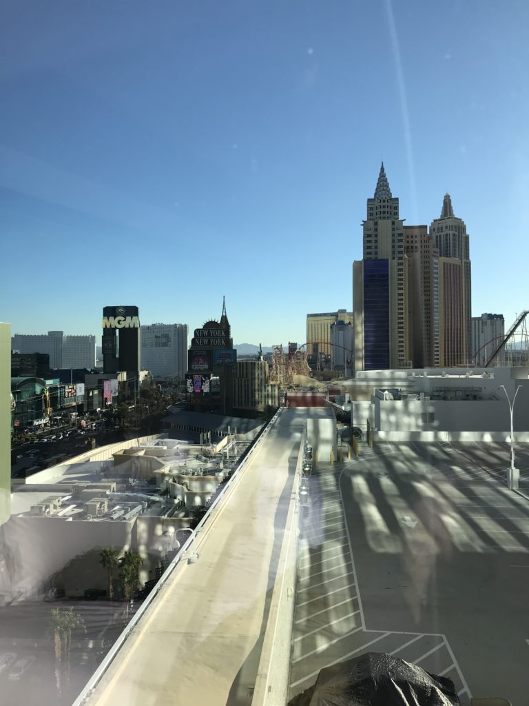 a city with buildings and a blue sky