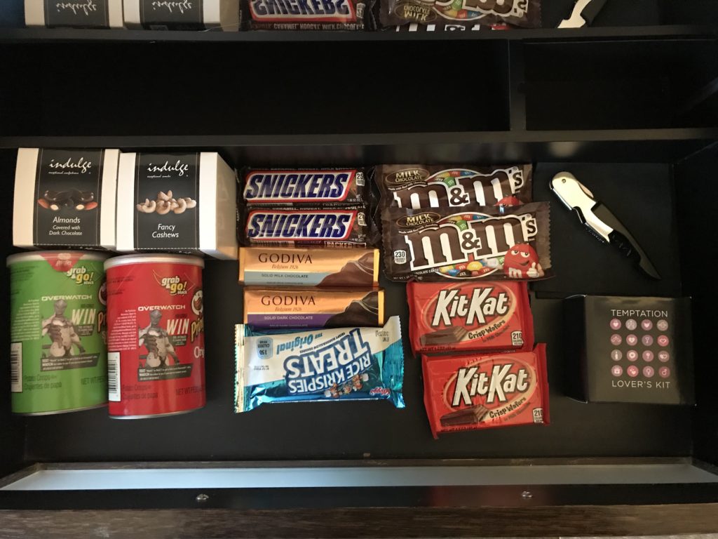 a shelf with different types of candy