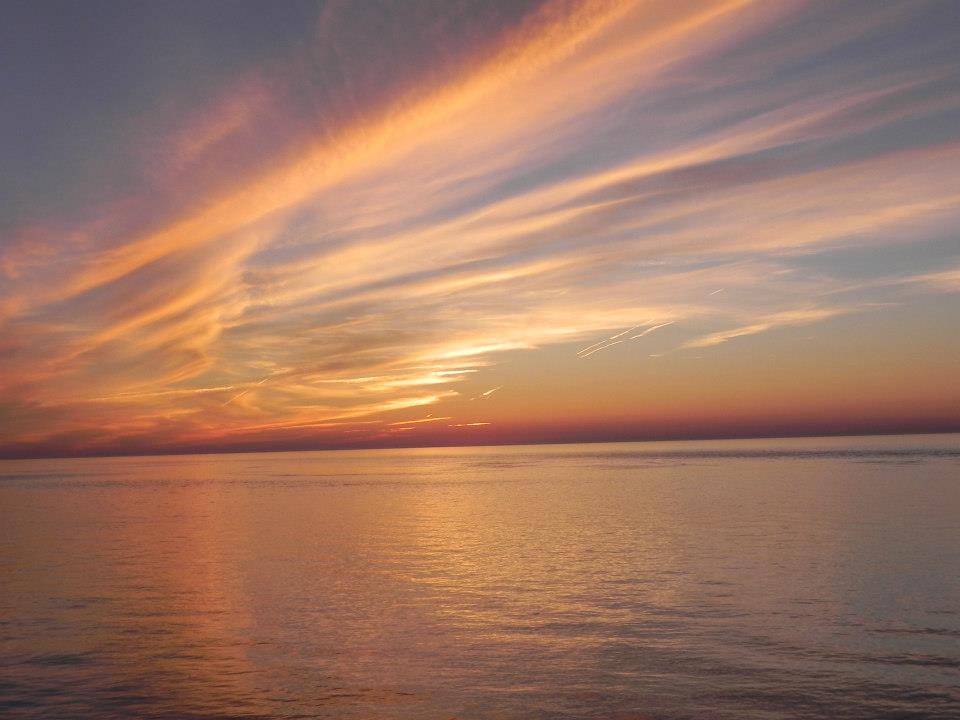 a sunset over the ocean