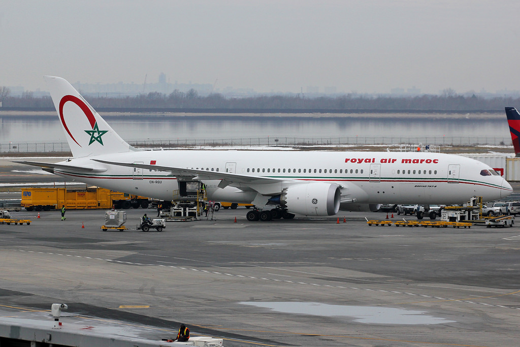 a large white airplane on a tarmac