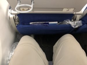 a seat with a pocket in the back