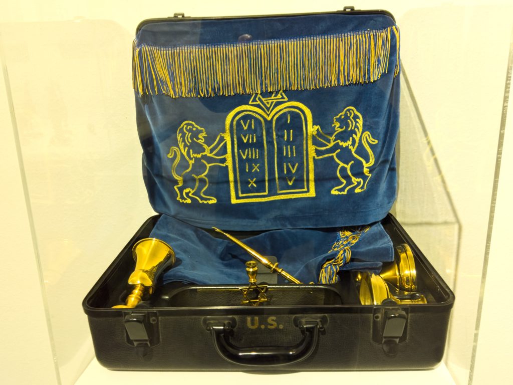 a case with a blue cloth and gold trim