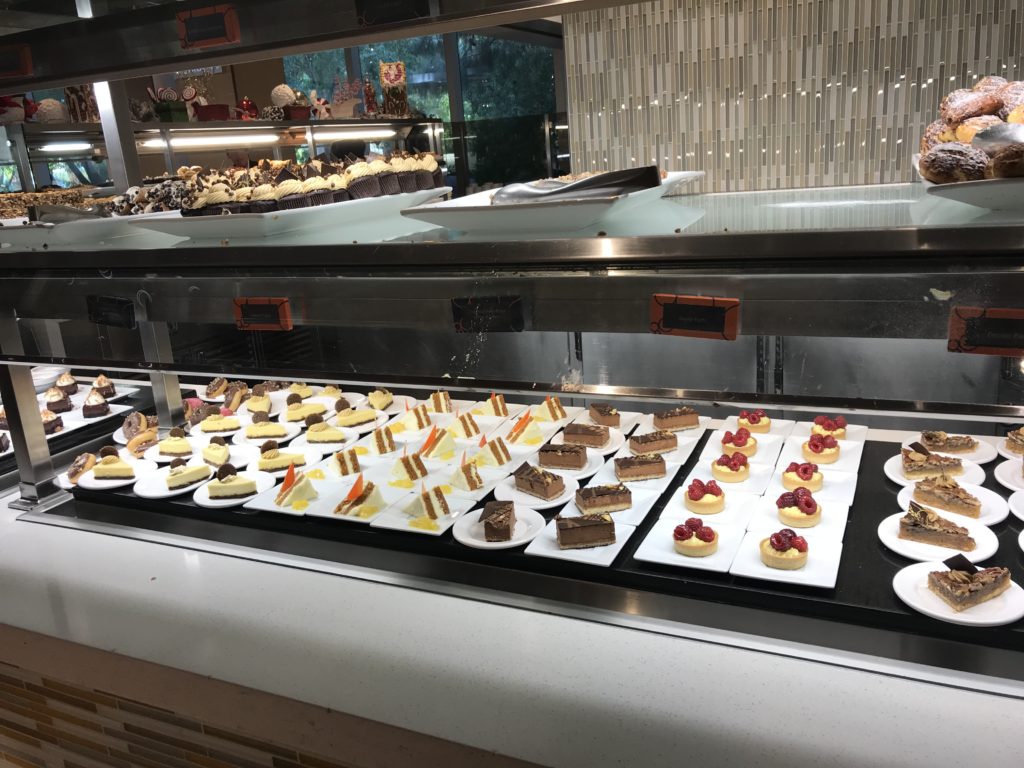 a display of desserts on plates