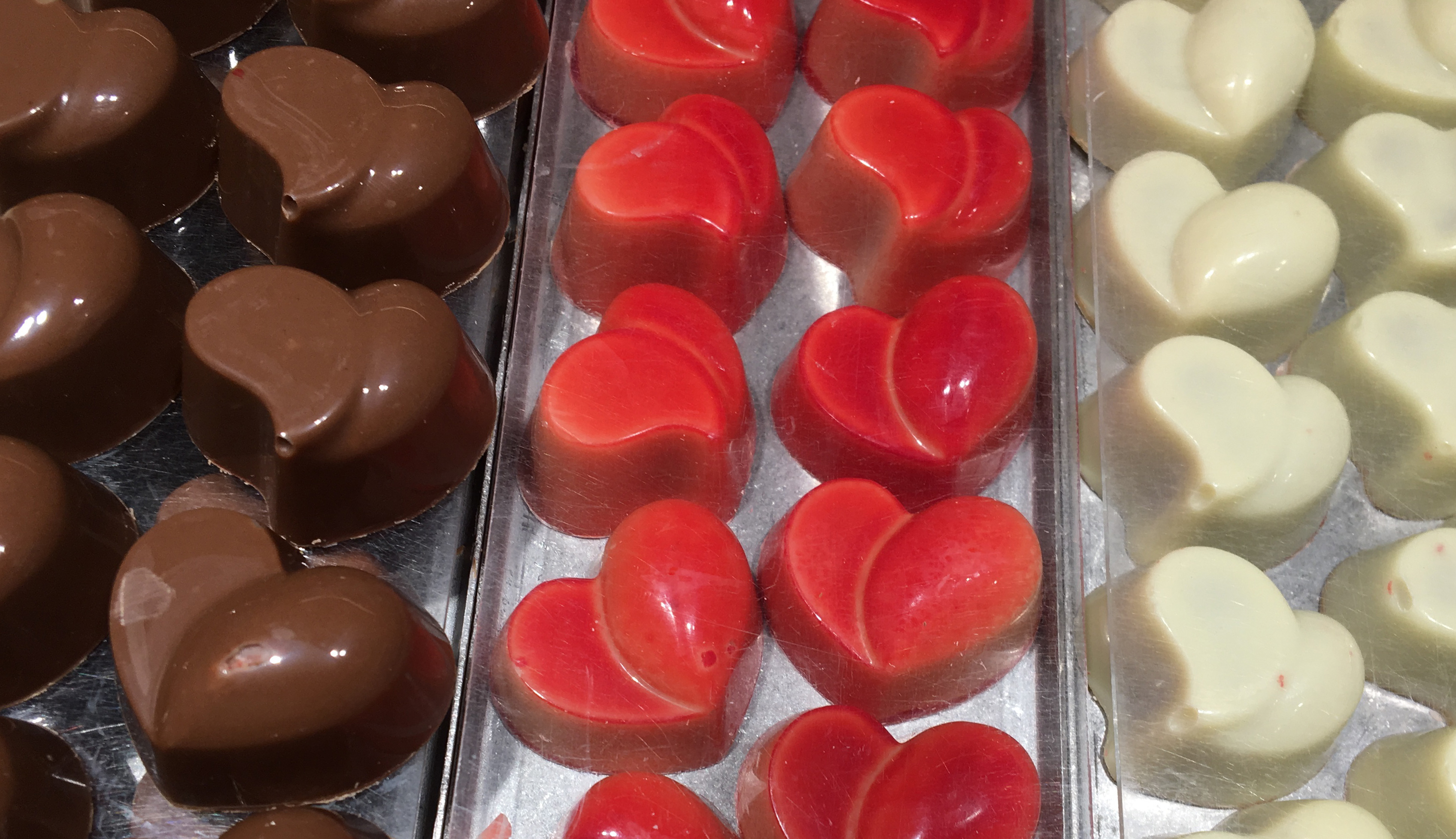 a tray of chocolates in the shape of a heart