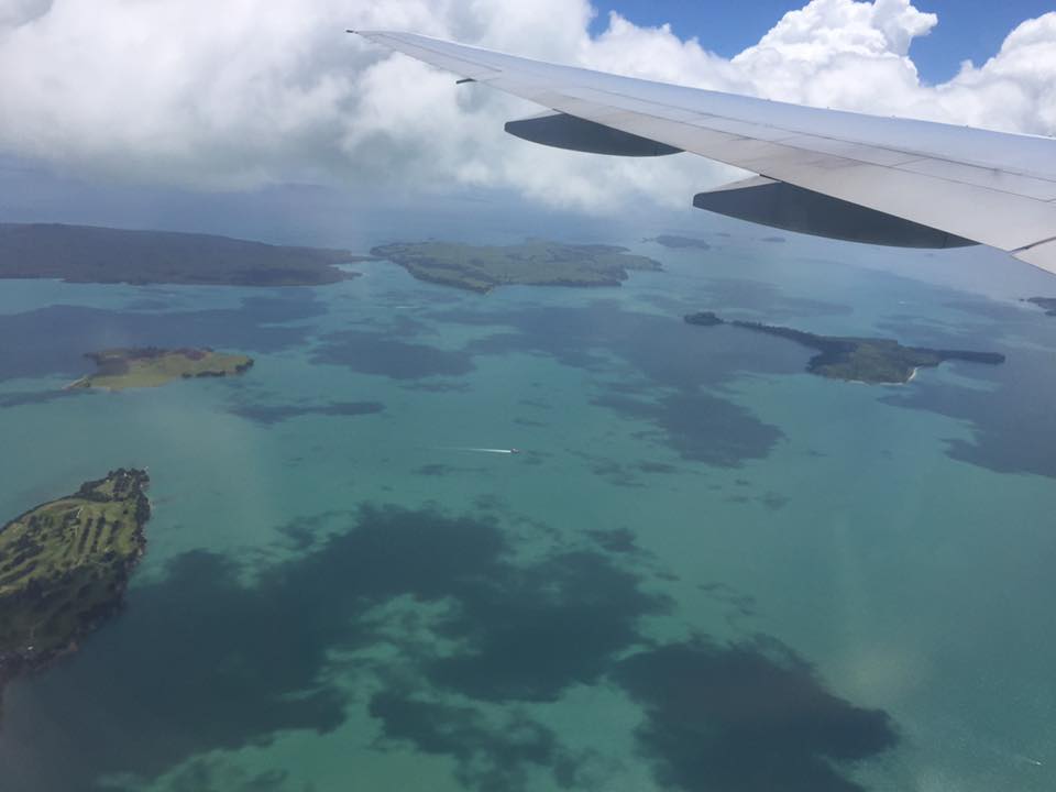 an airplane wing over water